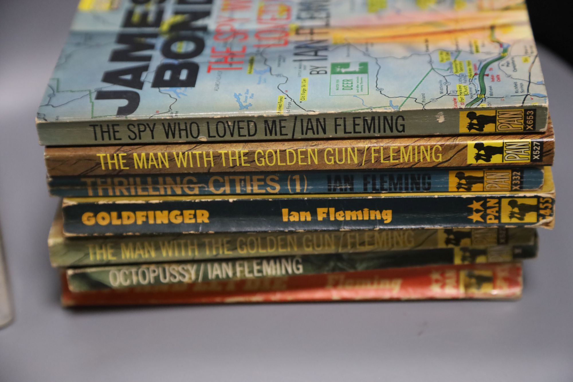 Fleming, Ian. (James Bond). A Collection of Pan Paperbacks, includes Casino Royale, 2nd printing; Thunderball, 1st printing; The Spy